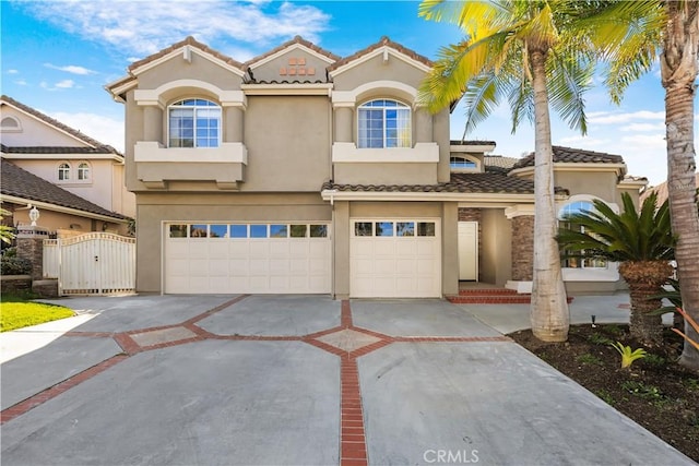 mediterranean / spanish-style house featuring a garage