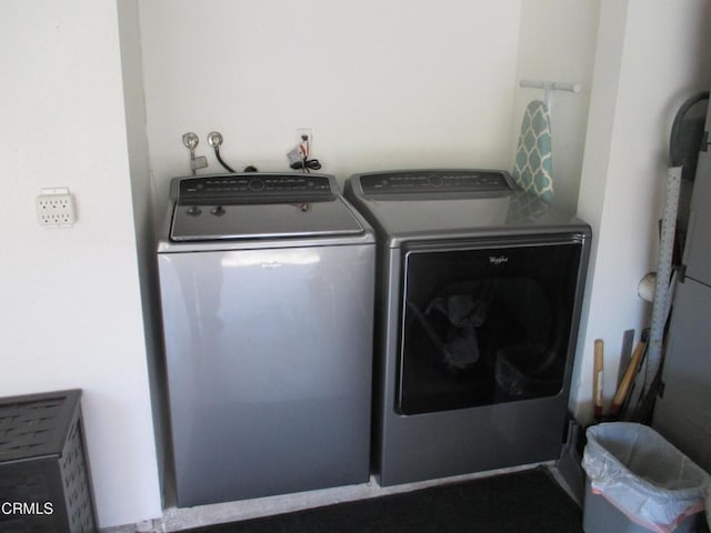 laundry room featuring washing machine and dryer