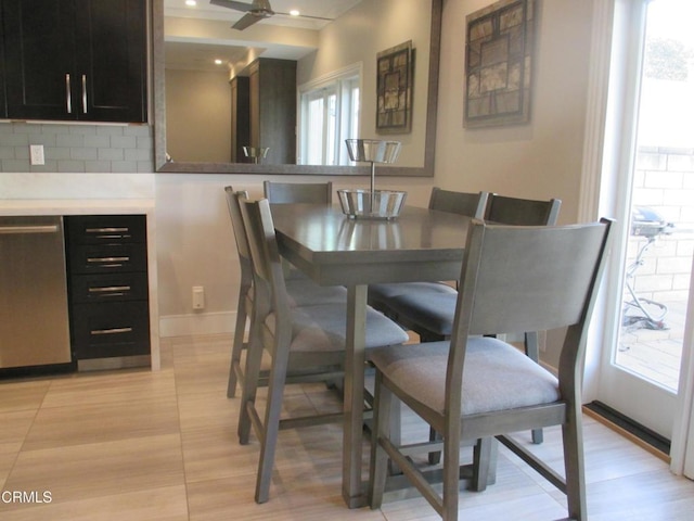 dining room with ceiling fan and light tile patterned floors