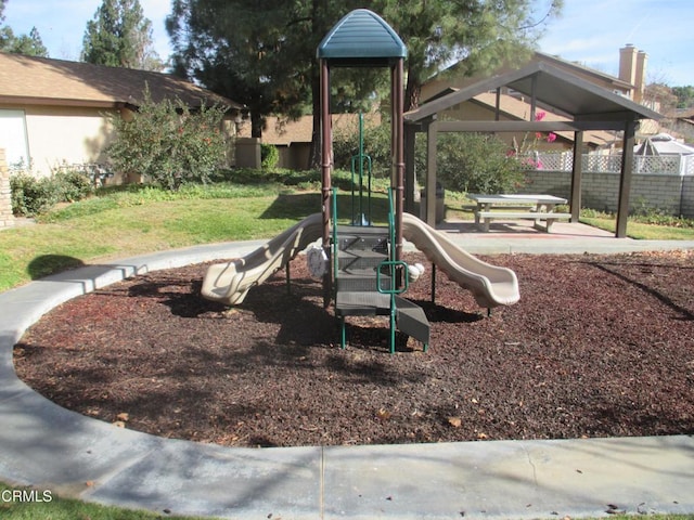 view of playground featuring a yard