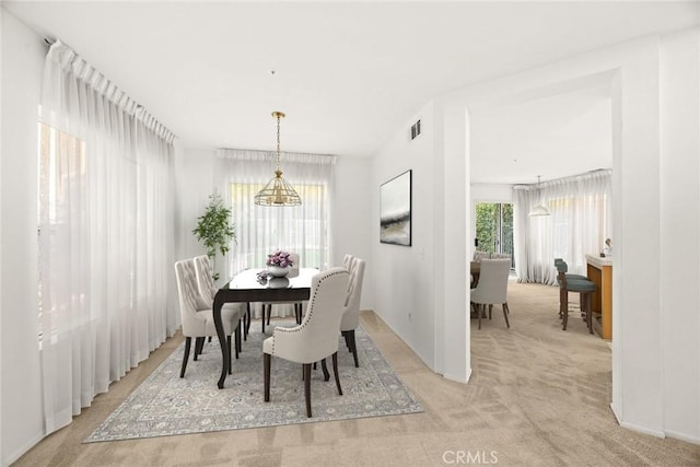 view of carpeted dining room