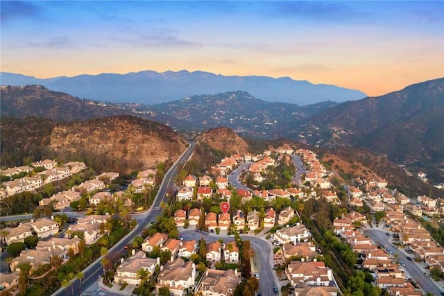 aerial view at dusk with a mountain view