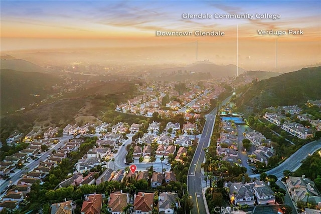 aerial view at dusk with a mountain view