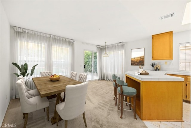 view of carpeted dining room