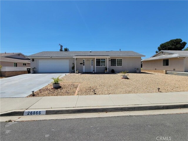 single story home featuring a garage