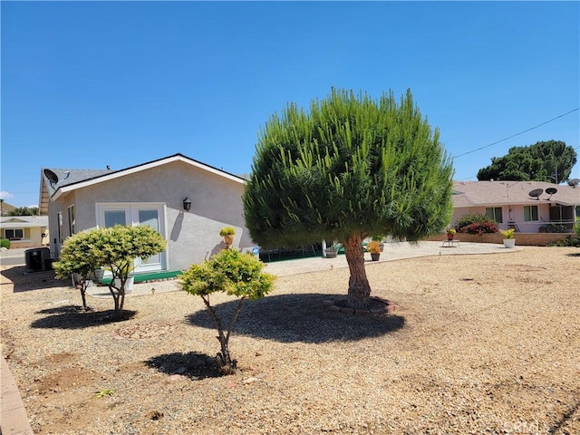 view of front of property with cooling unit