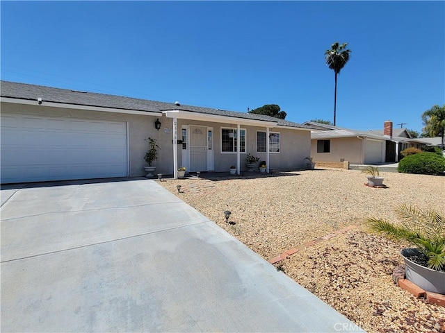 single story home with a garage