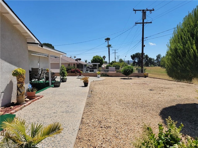 view of yard with a patio