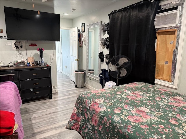 bedroom featuring light wood-type flooring