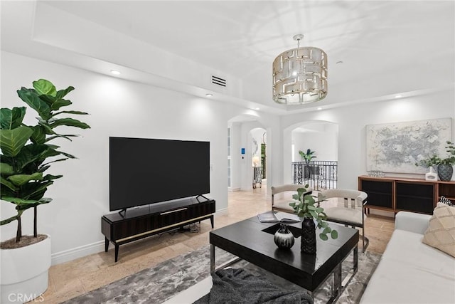 living room with a chandelier