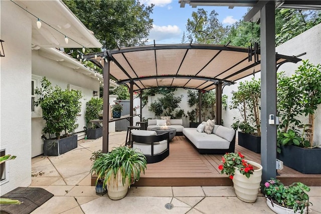 view of patio with a pergola and an outdoor living space