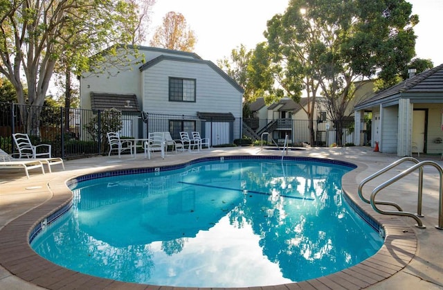 view of pool with a patio area