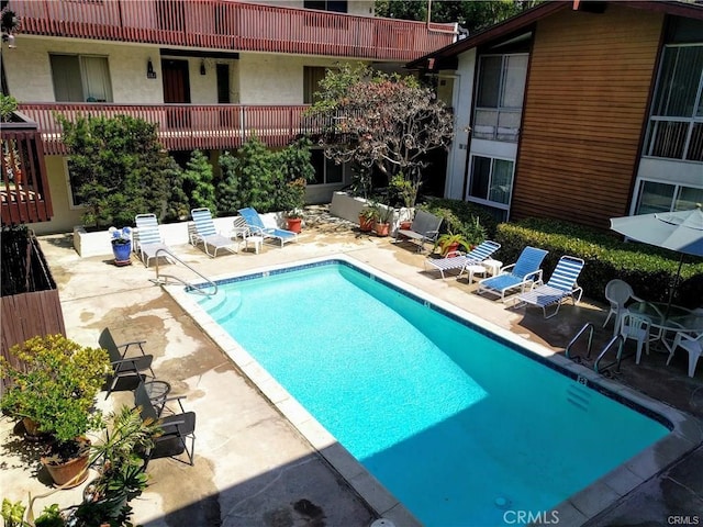 view of pool featuring a patio area