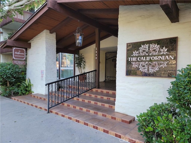 entrance to property with a porch