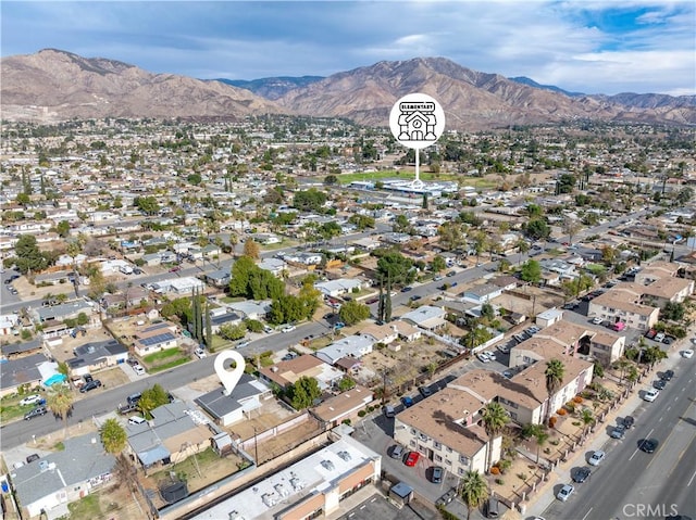 drone / aerial view featuring a mountain view