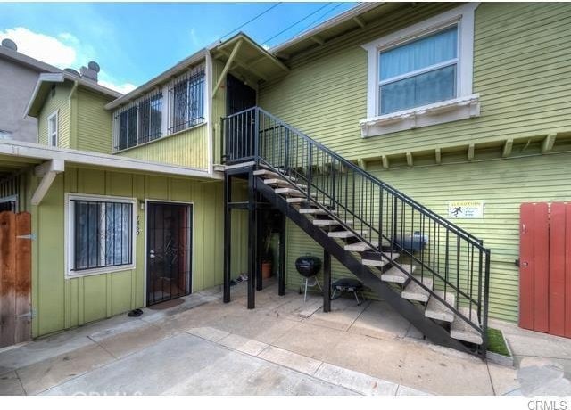 entrance to property with a patio area