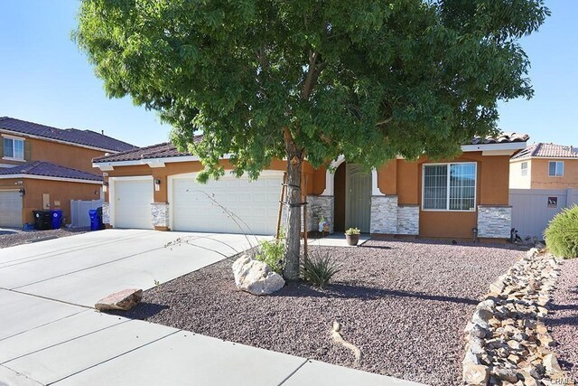 view of front of home featuring a garage