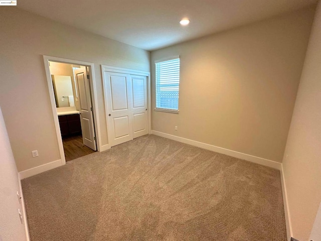 garage with electric panel, tankless water heater, and a garage door opener