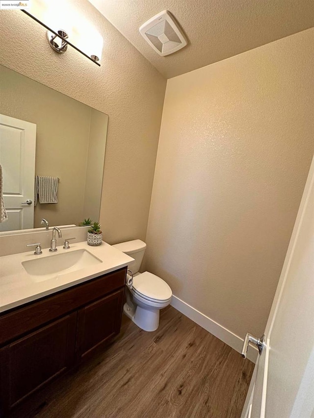 carpeted bedroom with a textured ceiling