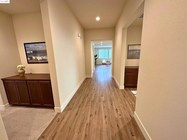 home office with light colored carpet and french doors