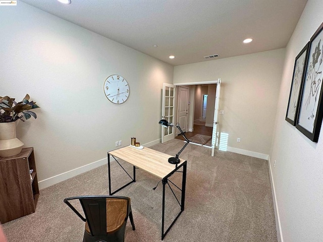 office area featuring light carpet and french doors