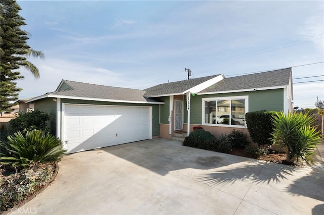 ranch-style home featuring a garage