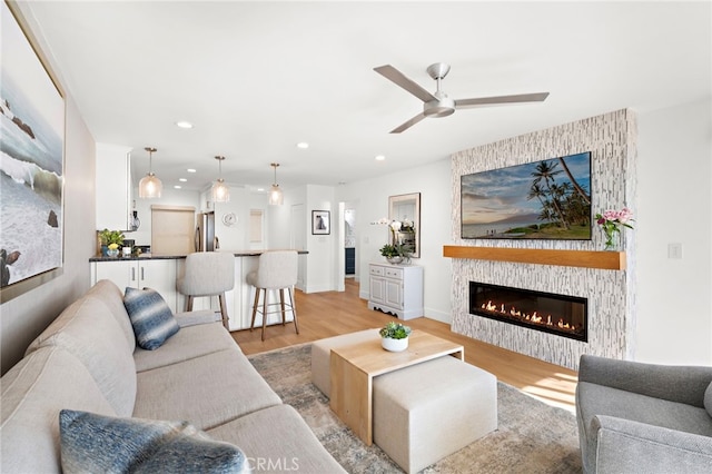 240 Moss St Unit 4, Laguna Beach, CA 92651 - living room featuring recessed lighting, light wood finished floors, a fireplace, and ceiling fan