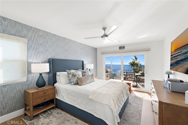 240 Moss St Unit 4, Laguna Beach, CA 92651 - bedroom with wallpapered walls, access to outside, light wood-style floors, and a ceiling fan