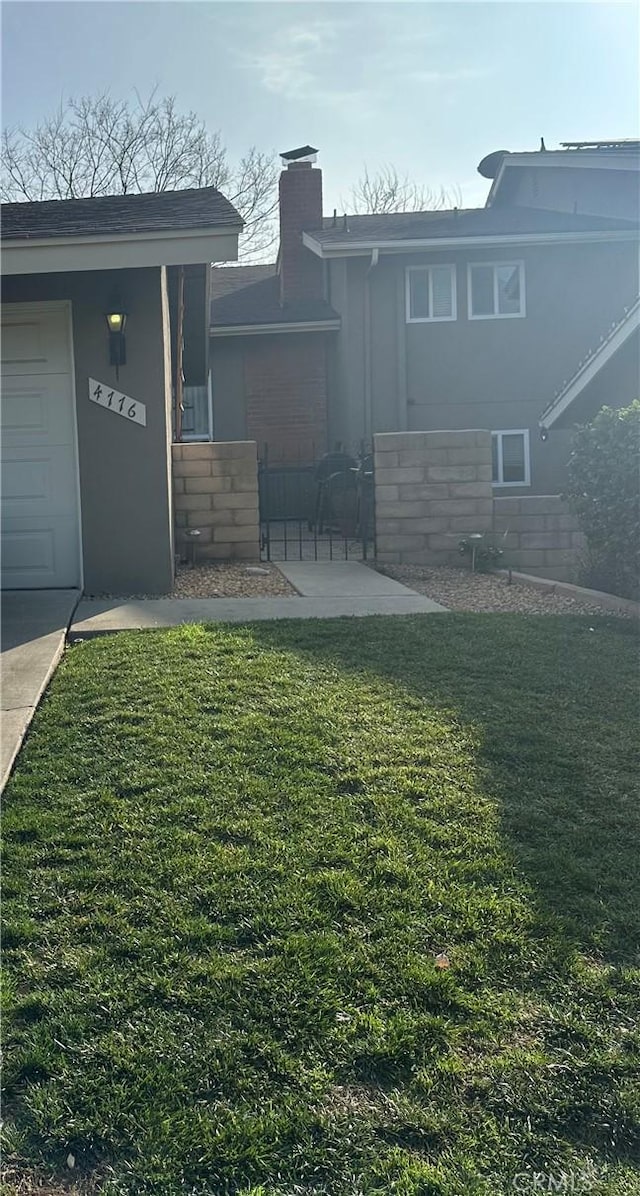 view of yard with a garage