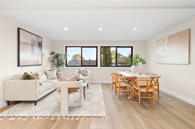 dining space with light wood-type flooring