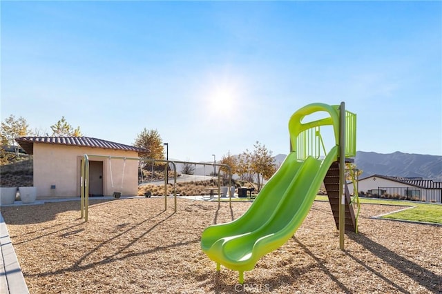 view of play area with a mountain view