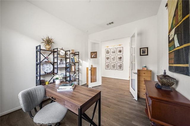 office space with dark hardwood / wood-style floors and french doors