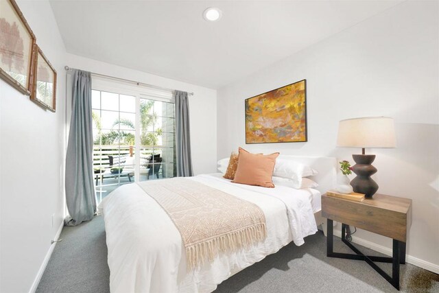 bedroom featuring access to outside and carpet floors