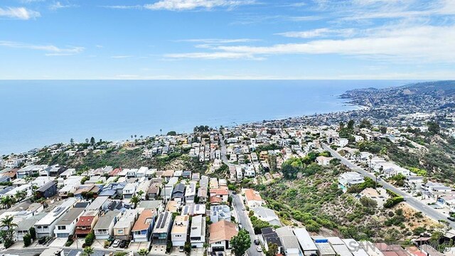 bird's eye view with a water view