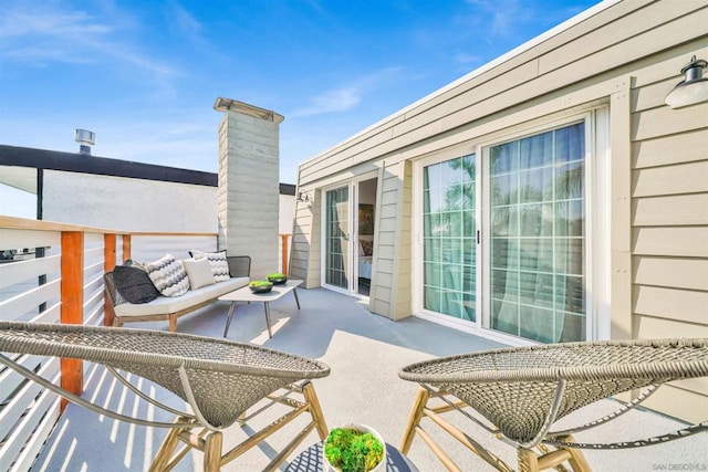 balcony featuring an outdoor living space