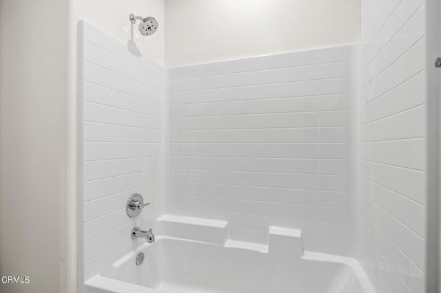 bathroom with shower / tub combination