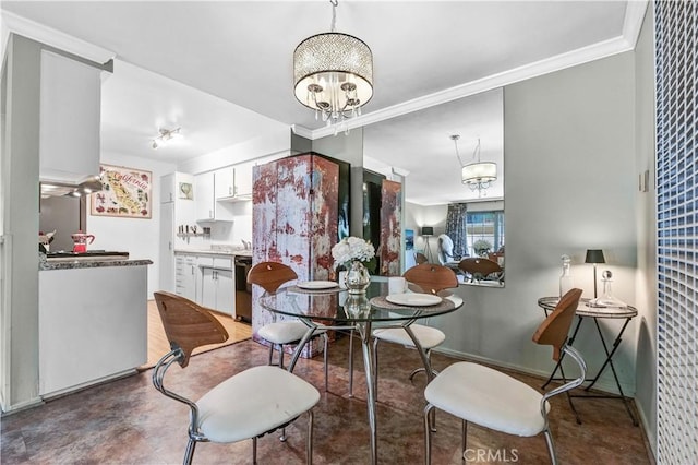 dining area featuring an inviting chandelier and crown molding