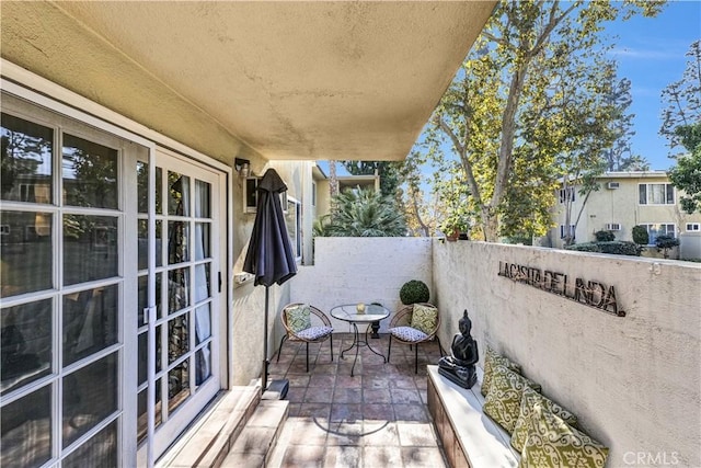 balcony featuring a patio area