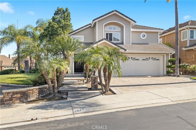 view of property featuring a garage