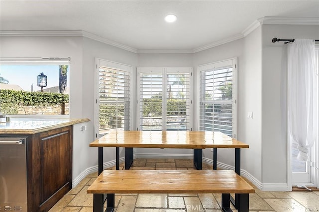 dining area featuring ornamental molding