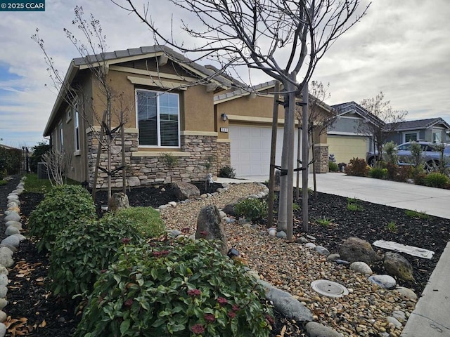 view of side of property featuring a garage