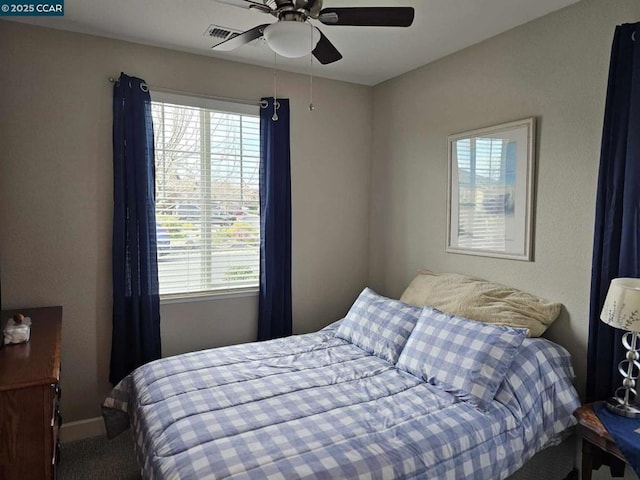 bedroom featuring ceiling fan