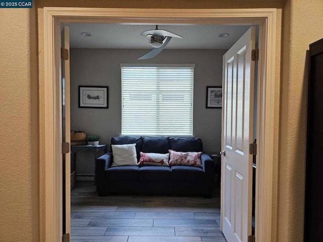 hall with wood-type flooring