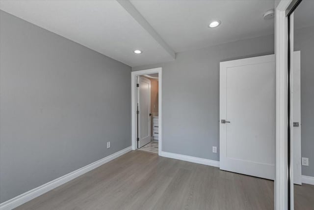 unfurnished bedroom featuring light hardwood / wood-style flooring