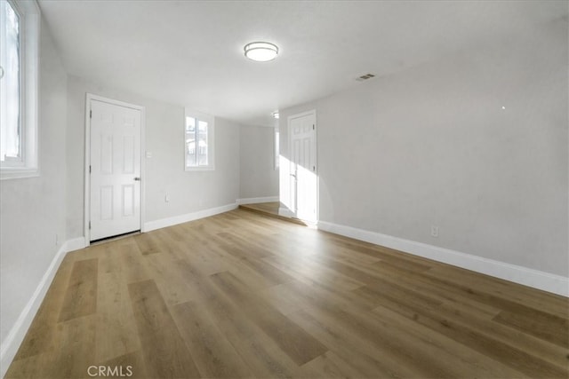 interior space with hardwood / wood-style flooring