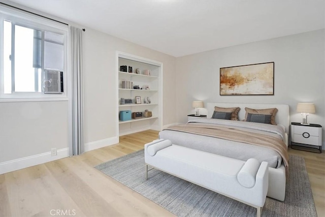 bedroom featuring hardwood / wood-style flooring