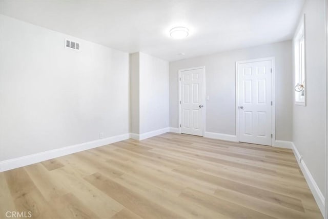 empty room featuring light wood-type flooring