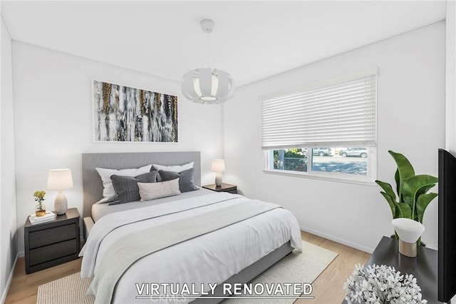 bedroom featuring light wood-type flooring