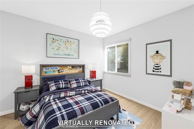 bedroom featuring light hardwood / wood-style floors