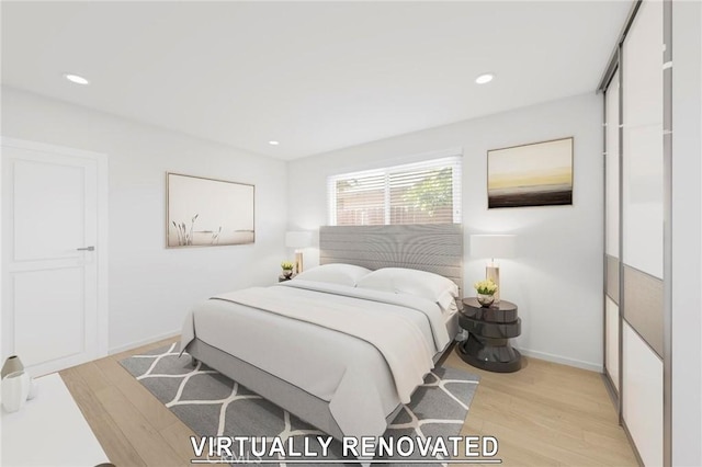 bedroom featuring light hardwood / wood-style floors